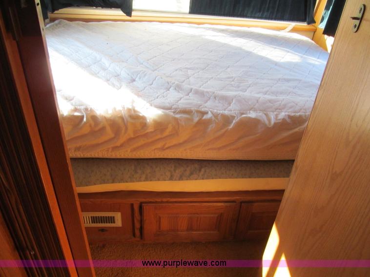 image for item E5870 1986 Chevrolet Imperial Holiday Rambler 33' RV