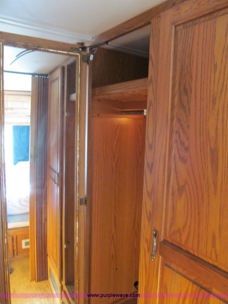 image for item E5870 1986 Chevrolet Imperial Holiday Rambler 33' RV