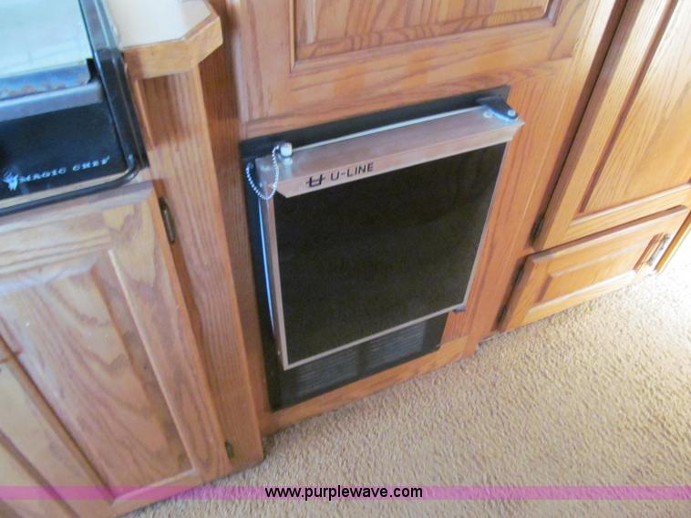 image for item E5870 1986 Chevrolet Imperial Holiday Rambler 33' RV