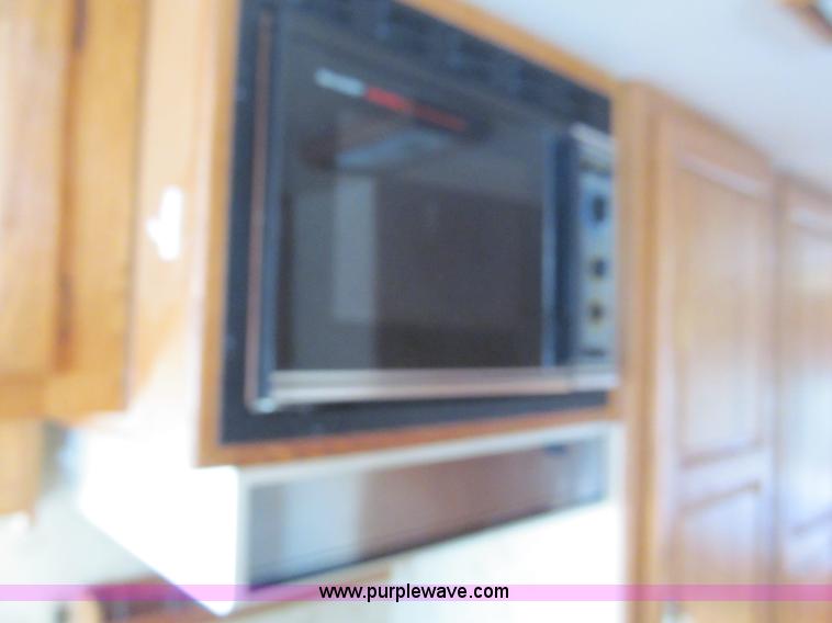 image for item E5870 1986 Chevrolet Imperial Holiday Rambler 33' RV