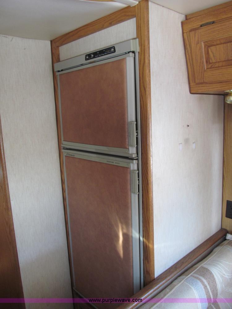 image for item E5870 1986 Chevrolet Imperial Holiday Rambler 33' RV