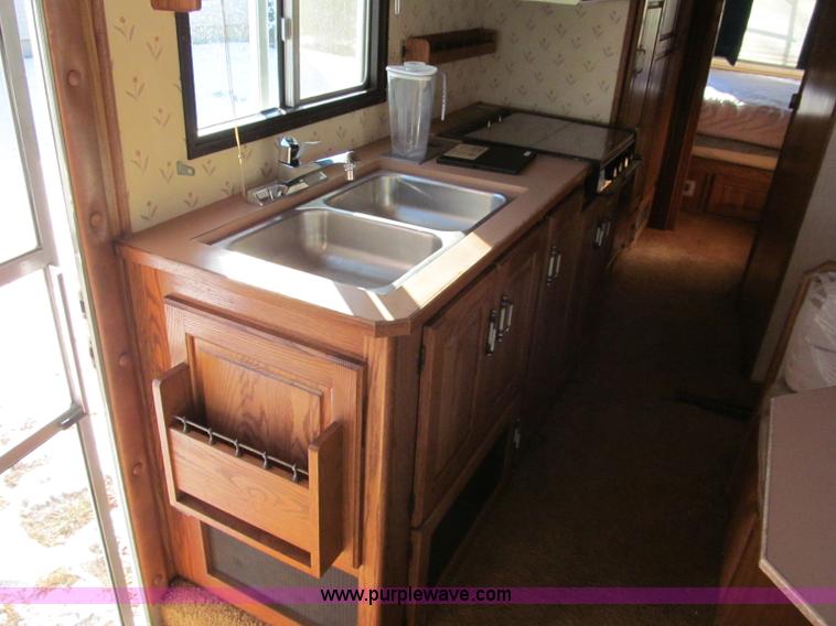 image for item E5870 1986 Chevrolet Imperial Holiday Rambler 33' RV