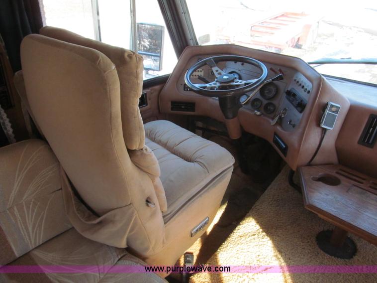 image for item E5870 1986 Chevrolet Imperial Holiday Rambler 33' RV