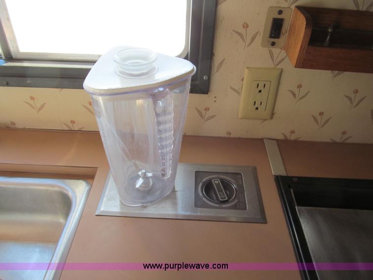 image for item E5870 1986 Chevrolet Imperial Holiday Rambler 33' RV