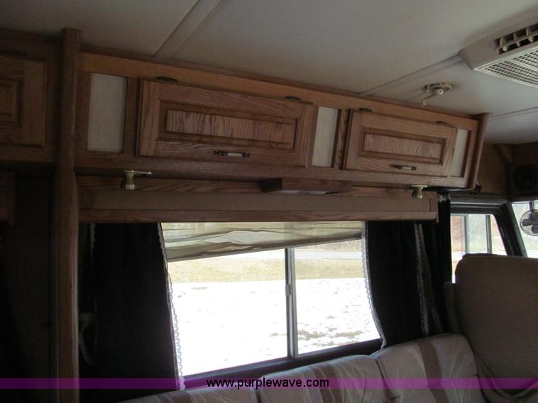 image for item E5870 1986 Chevrolet Imperial Holiday Rambler 33' RV