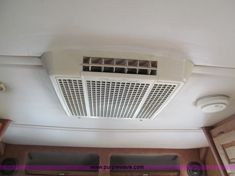 image for item E5870 1986 Chevrolet Imperial Holiday Rambler 33' RV