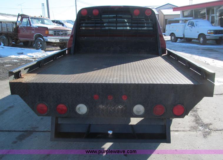 image for item E5875 1997 Toyota T100 DX Xtracab flatbed pickup truck