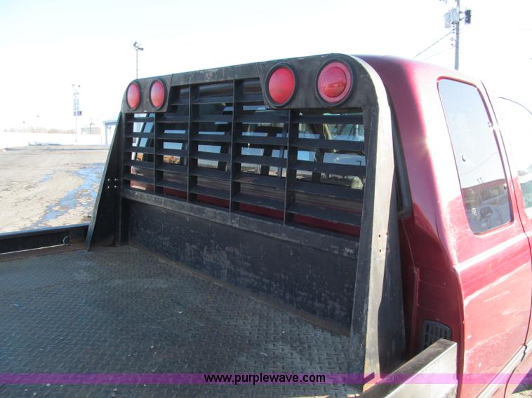 image for item E5875 1997 Toyota T100 DX Xtracab flatbed pickup truck