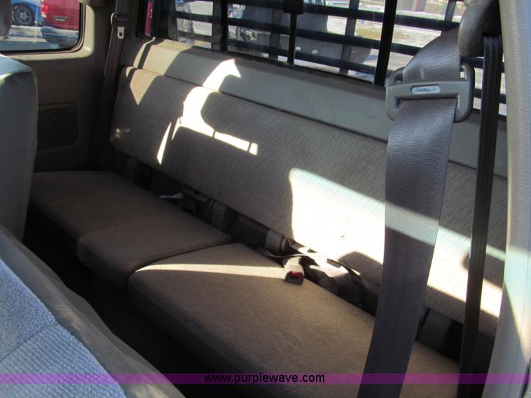 image for item E5875 1997 Toyota T100 DX Xtracab flatbed pickup truck