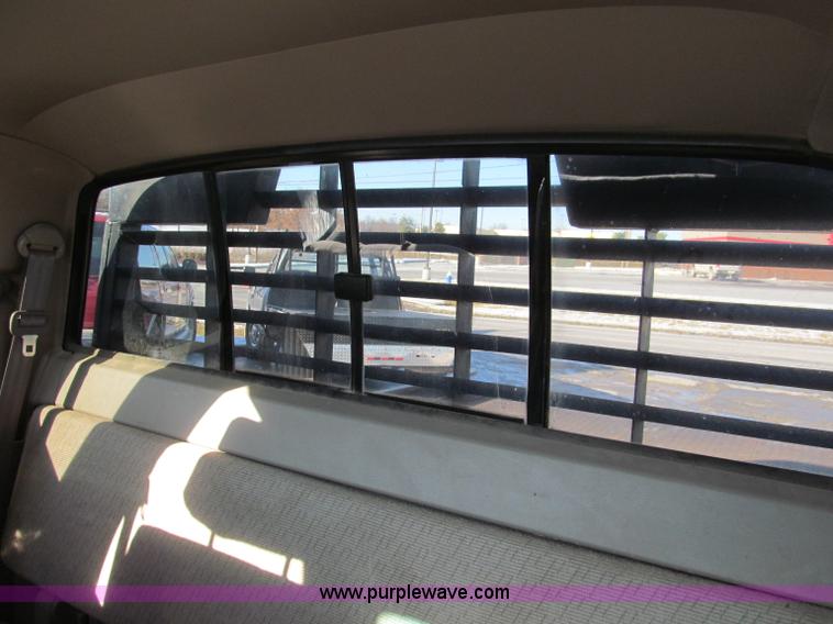 image for item E5875 1997 Toyota T100 DX Xtracab flatbed pickup truck