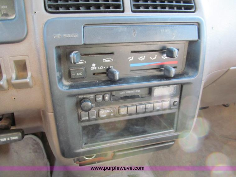 image for item E5875 1997 Toyota T100 DX Xtracab flatbed pickup truck