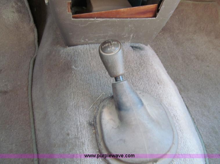 image for item E5875 1997 Toyota T100 DX Xtracab flatbed pickup truck