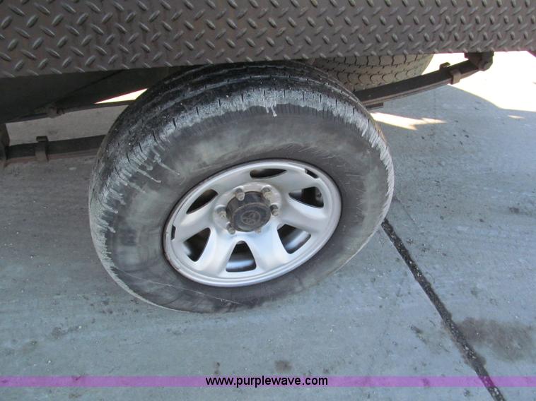 image for item E5875 1997 Toyota T100 DX Xtracab flatbed pickup truck