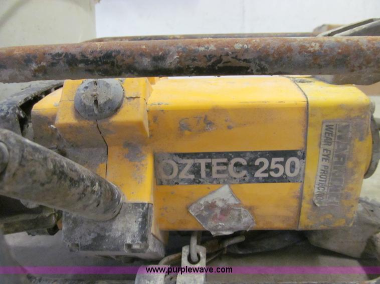 image for item O9130 Oztec Industries concrete vibrator and hand tools