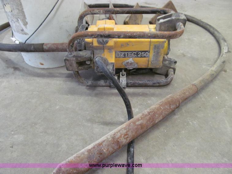 image for item O9130 Oztec Industries concrete vibrator and hand tools