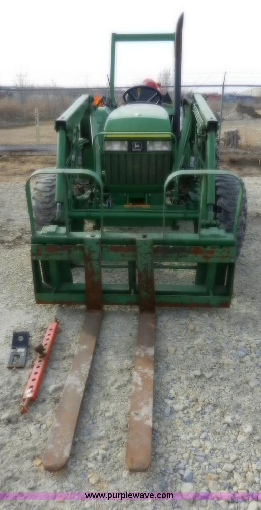 image for item D4598 2000 John Deere 990 MFWD tractor