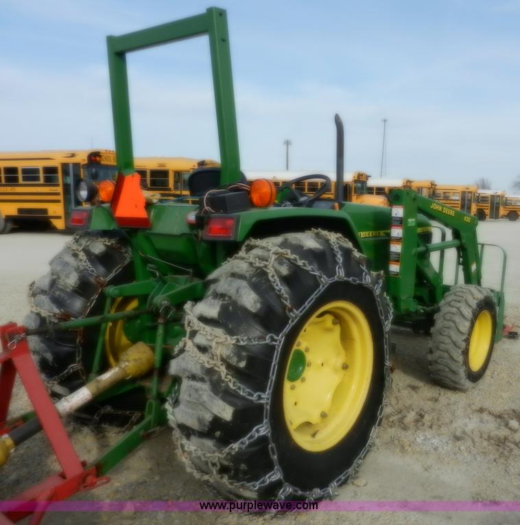 image for item D4598 2000 John Deere 990 MFWD tractor