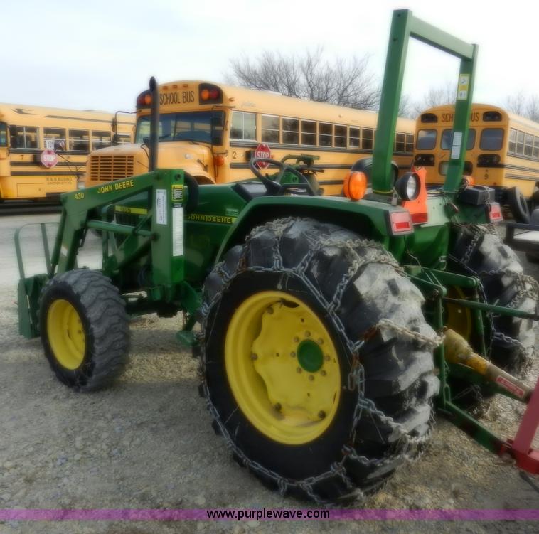 image for item D4598 2000 John Deere 990 MFWD tractor