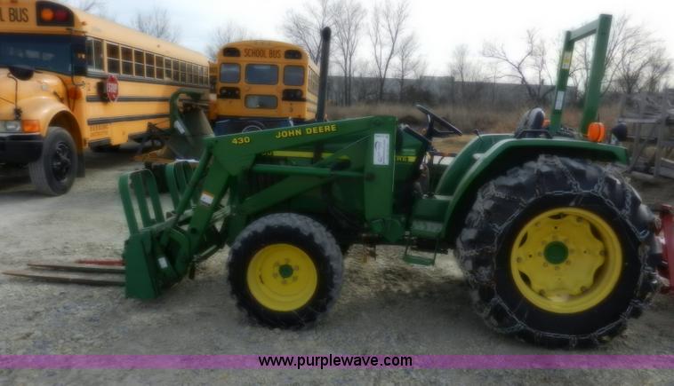 image for item D4598 2000 John Deere 990 MFWD tractor