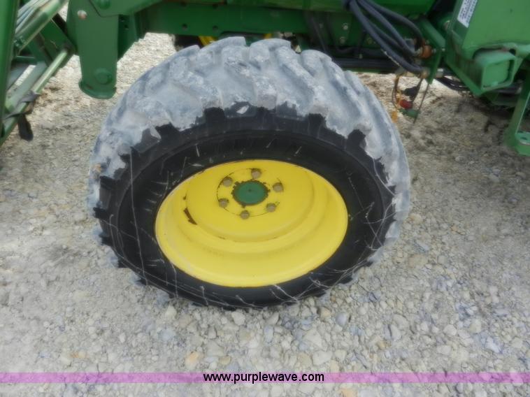 image for item D4598 2000 John Deere 990 MFWD tractor