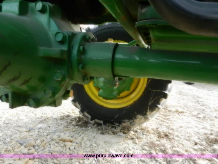 image for item D4598 2000 John Deere 990 MFWD tractor