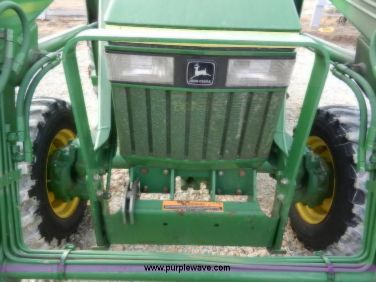 image for item D4598 2000 John Deere 990 MFWD tractor