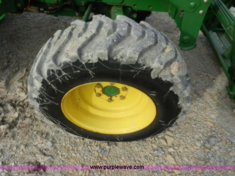 image for item D4598 2000 John Deere 990 MFWD tractor
