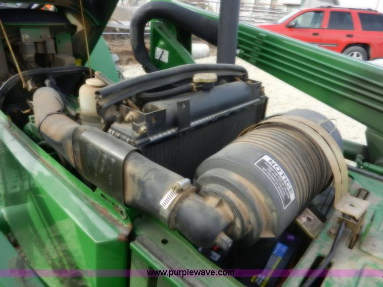 image for item D4598 2000 John Deere 990 MFWD tractor