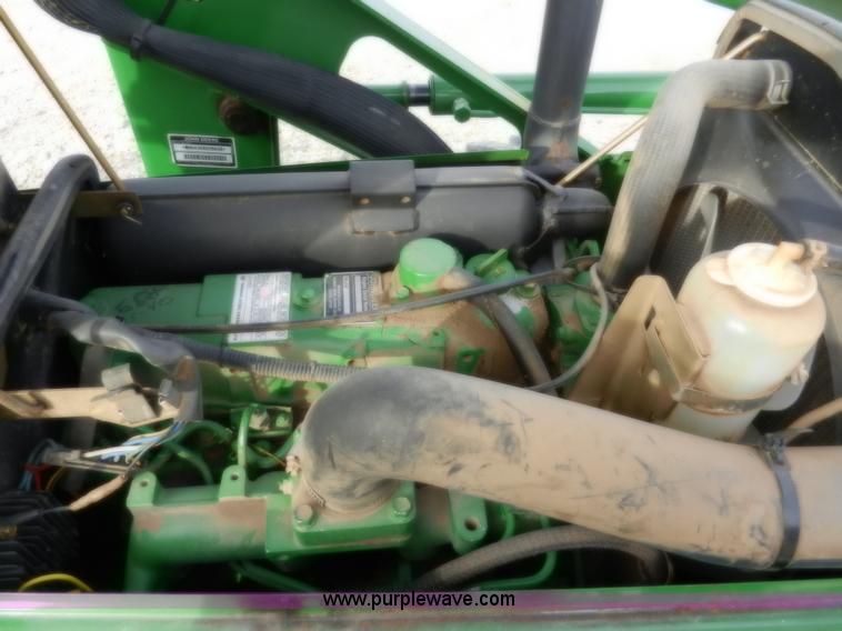 image for item D4598 2000 John Deere 990 MFWD tractor