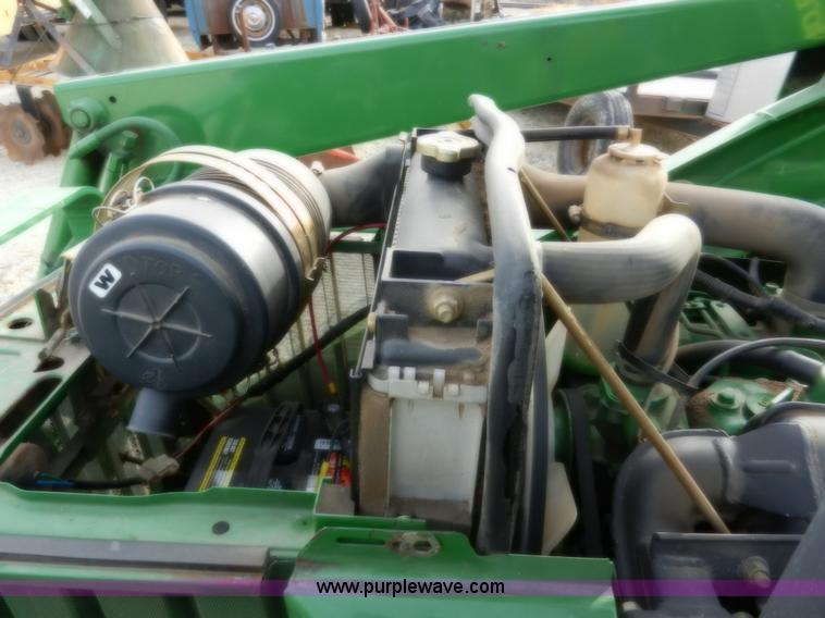 image for item D4598 2000 John Deere 990 MFWD tractor