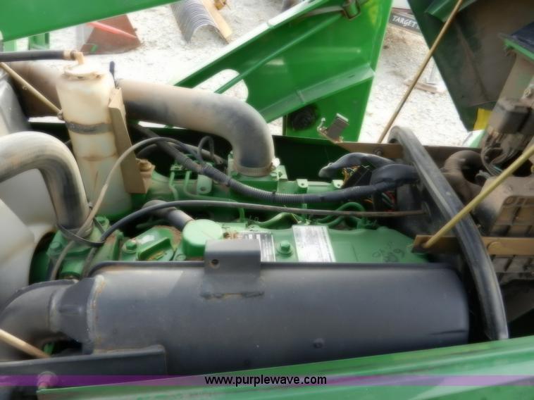 image for item D4598 2000 John Deere 990 MFWD tractor