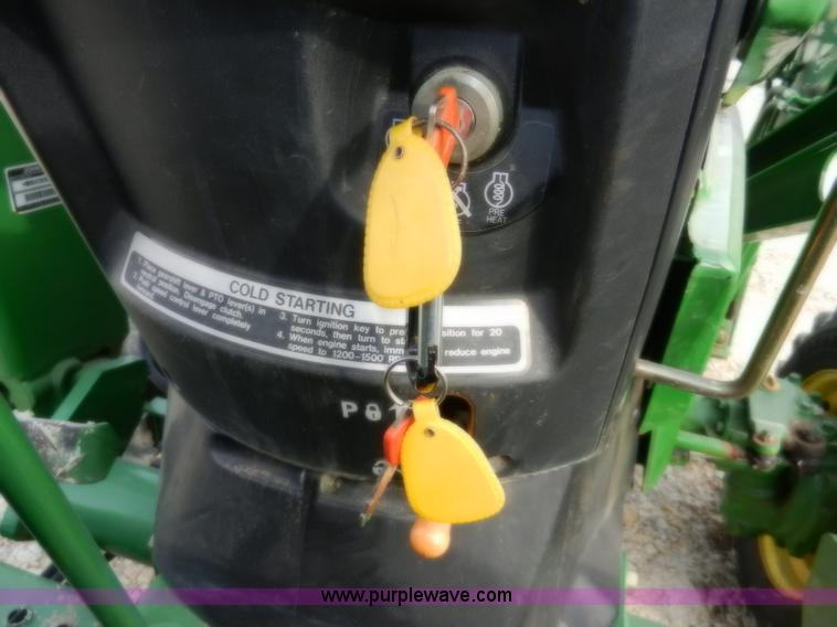 image for item D4598 2000 John Deere 990 MFWD tractor