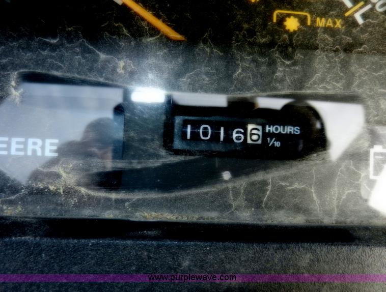 image for item D4598 2000 John Deere 990 MFWD tractor