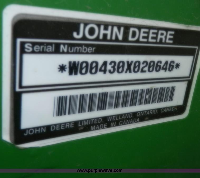 image for item D4598 2000 John Deere 990 MFWD tractor