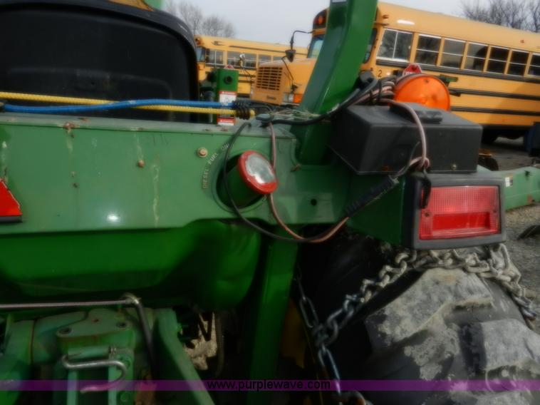 image for item D4598 2000 John Deere 990 MFWD tractor