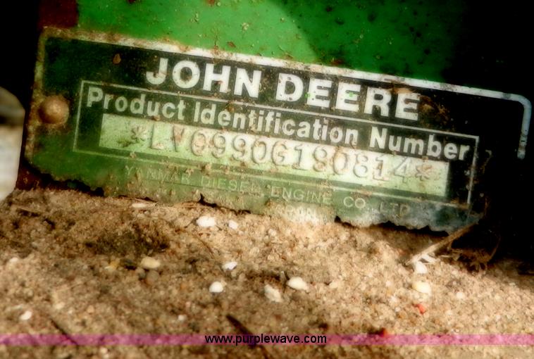 image for item D4598 2000 John Deere 990 MFWD tractor