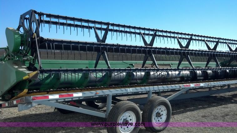 image for item E8358 2002 John Deere 930F flex head