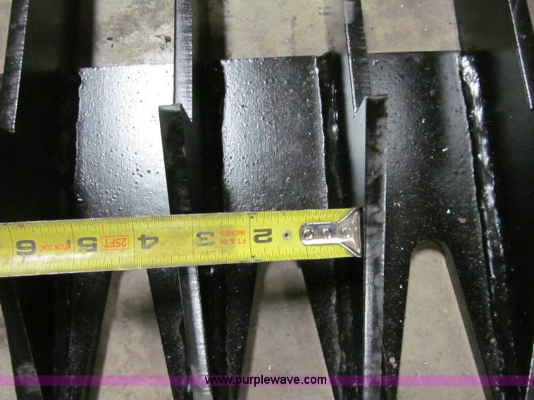 image for item F5896 74" skid steer skeleton rock grapple bucket