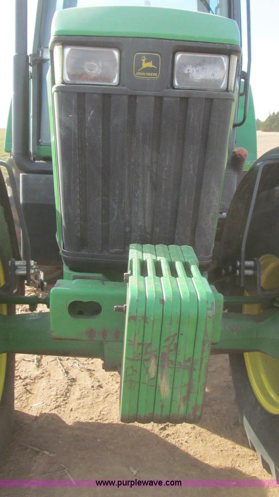 image for item G5628 2002 John Deere 7610 MFWD tractor