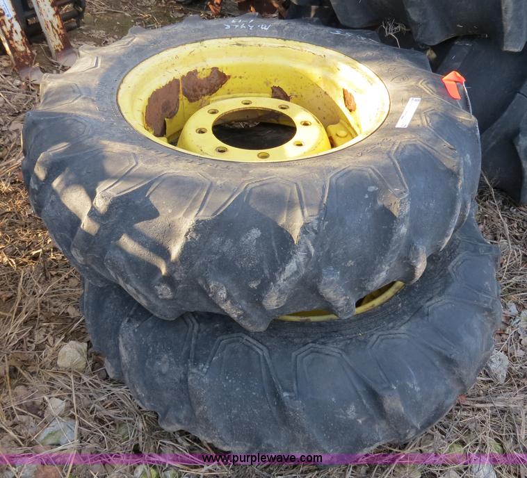 (2) Firestone All Traction 12.424 field and road tires and wheels in