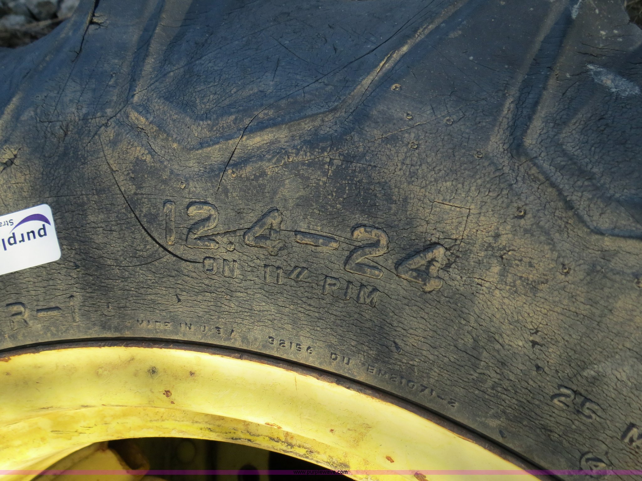 (2) Firestone All Traction 12.424 field and road tires and wheels in