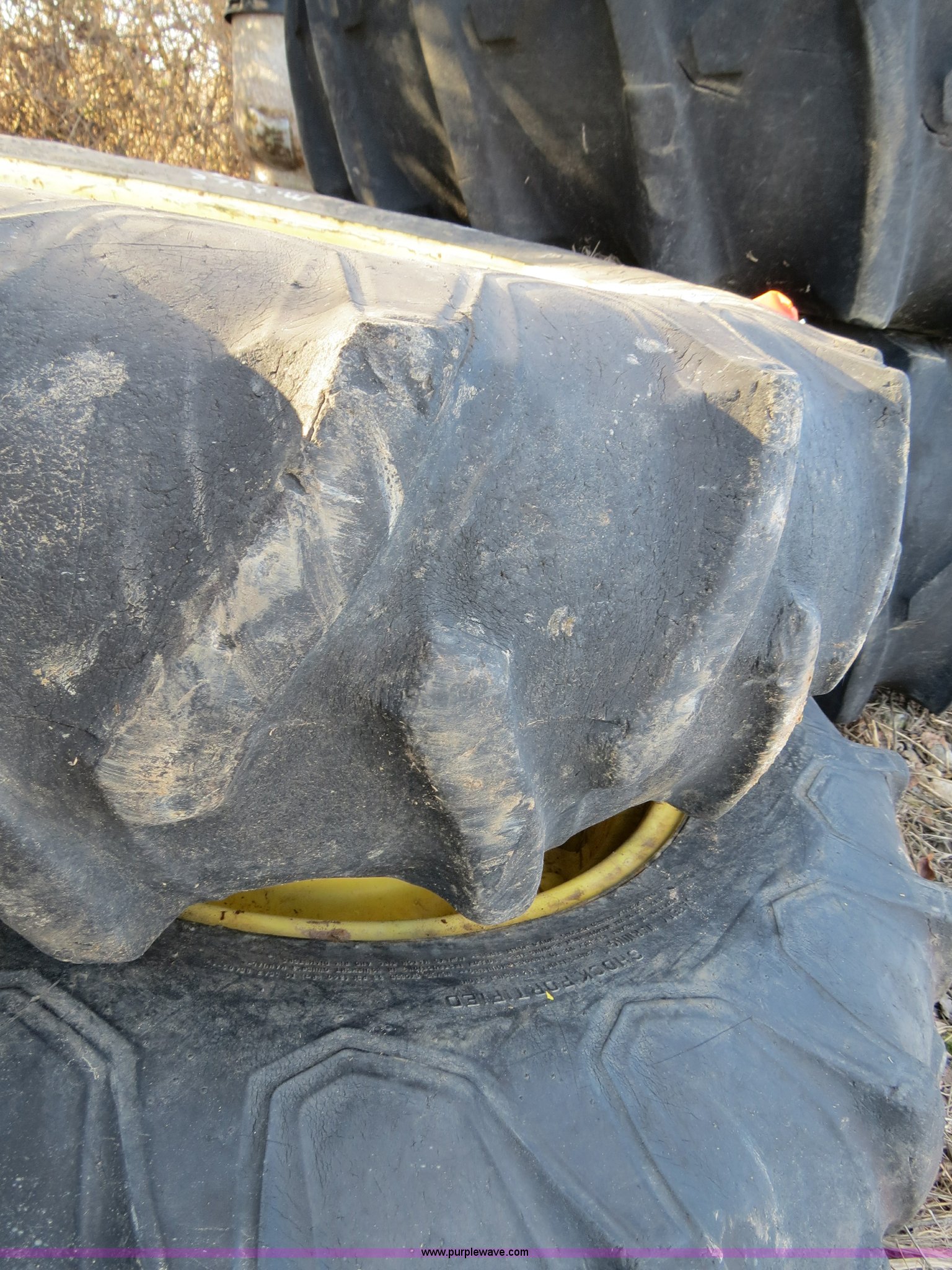 (2) Firestone All Traction 12.424 field and road tires and wheels in