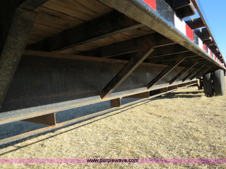 image for item B4560 2006 PJ GN32 32' gooseneck flatbed trailer