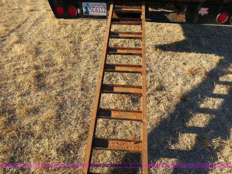 image for item B4560 2006 PJ GN32 32' gooseneck flatbed trailer