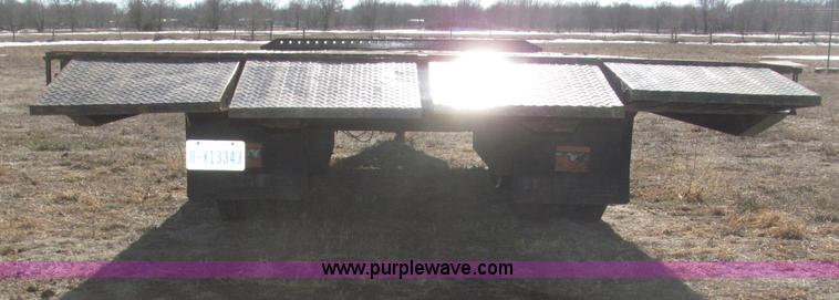 image for item B5327 1980 Miller 20T tilt deck tandem axle trailer