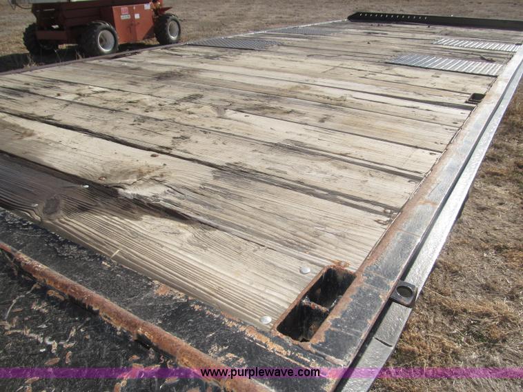 image for item B5327 1980 Miller 20T tilt deck tandem axle trailer