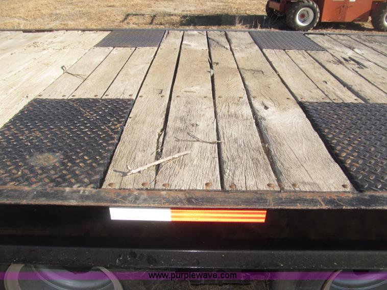 image for item B5327 1980 Miller 20T tilt deck tandem axle trailer