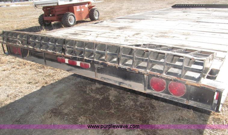 image for item B5327 1980 Miller 20T tilt deck tandem axle trailer