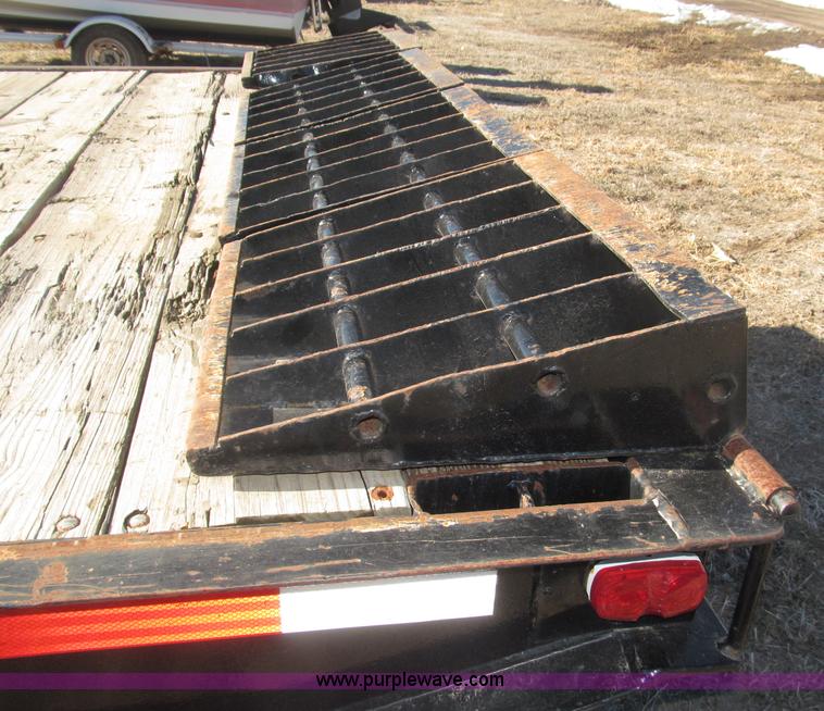 image for item B5327 1980 Miller 20T tilt deck tandem axle trailer