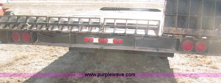 image for item B5327 1980 Miller 20T tilt deck tandem axle trailer